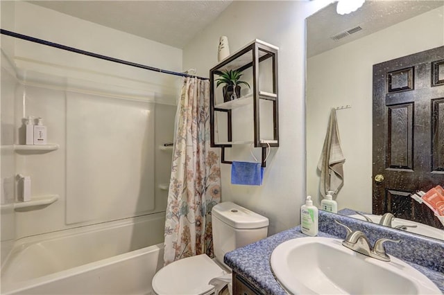 full bathroom featuring shower / bath combination with curtain, toilet, visible vents, and a textured ceiling