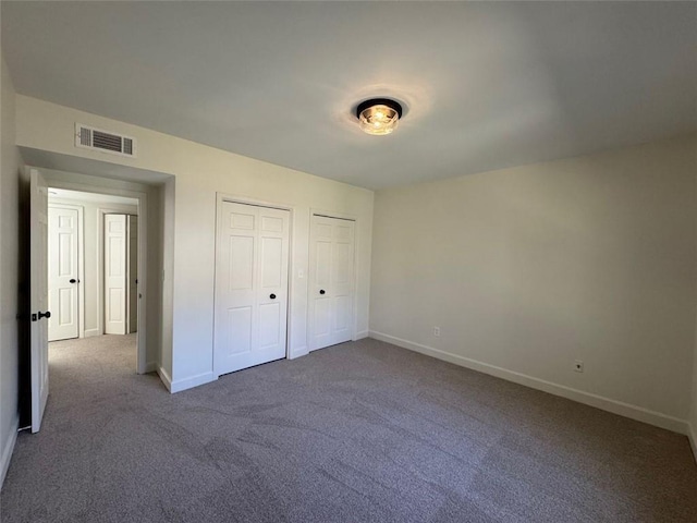 unfurnished bedroom featuring carpet floors