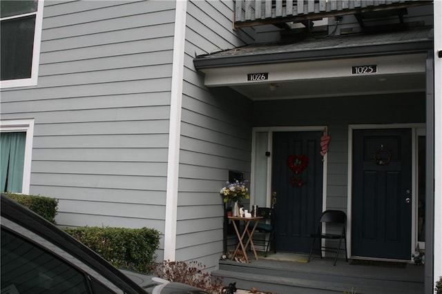 doorway to property with covered porch