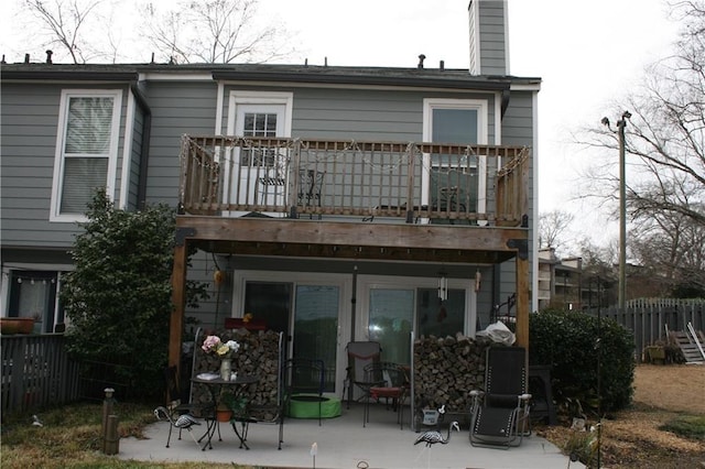 back of house with a patio area