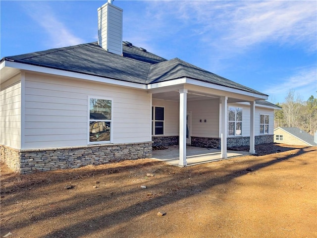 back of house featuring a patio area