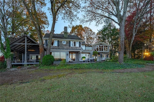 4252 Tall Hickory Trl, Gainesville, GA 30506 - back of property with a chimney and a lawn