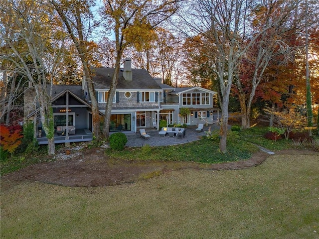 4252 Tall Hickory Trl, Gainesville, GA 30506 - back of property featuring a lawn, a patio, and a chimney