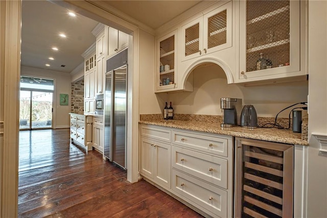 4252 Tall Hickory Trl, Gainesville, GA 30506 - bar with wine cooler, stainless steel built in fridge, dark wood-style floors, recessed lighting, and ornamental molding