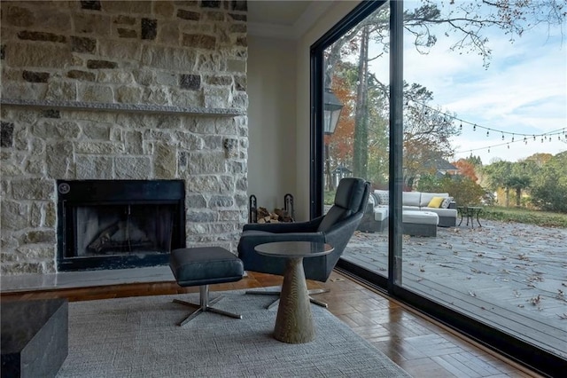 4252 Tall Hickory Trl, Gainesville, GA 30506 - living area featuring crown molding and an outdoor stone fireplace