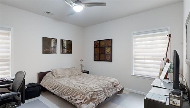 3311 Lindenridge Dr, Buford, GA 30519 - carpeted bedroom featuring baseboards, multiple windows, a ceiling fan, and visible vents