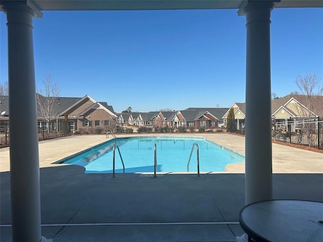 3311 Lindenridge Dr, Buford, GA 30519 - community pool with a residential view, fence, and a patio area