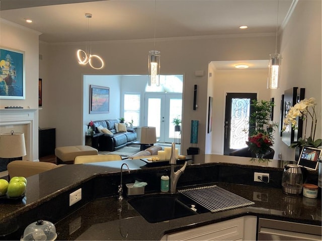 3311 Lindenridge Dr, Buford, GA 30519 - kitchen featuring crown molding, white cabinetry, and plenty of natural light