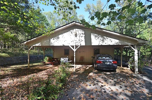 exterior space featuring a carport