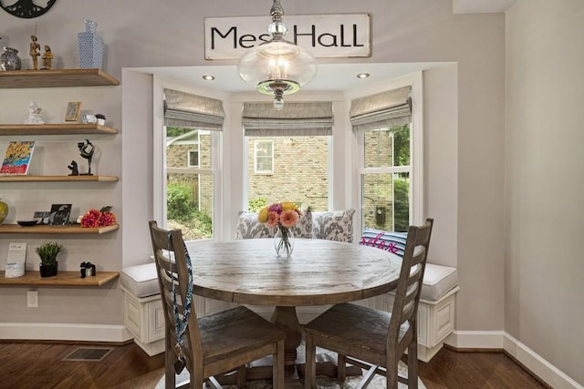 7265 Hunters Branch Dr, Sandy Springs, GA 30328 - dining space featuring baseboards and dark wood-type flooring
