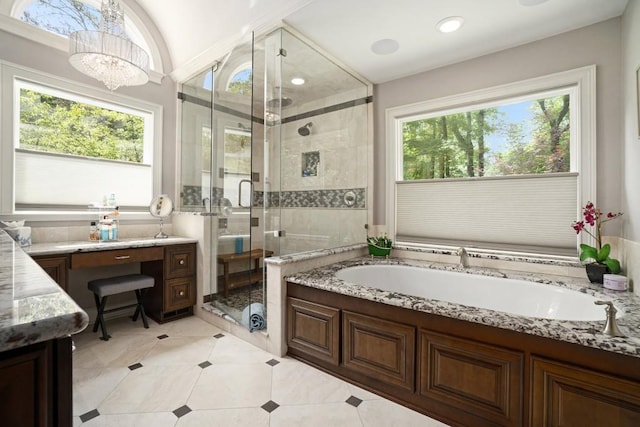 7265 Hunters Branch Dr, Sandy Springs, GA 30328 - bathroom with a garden tub, plenty of natural light, a shower stall, vanity, and recessed lighting