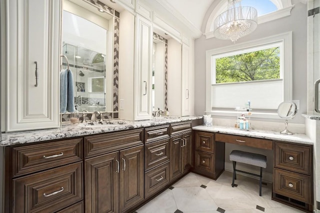 7265 Hunters Branch Dr, Sandy Springs, GA 30328 - bathroom featuring a stall shower, double vanity, a chandelier, and tile patterned floors