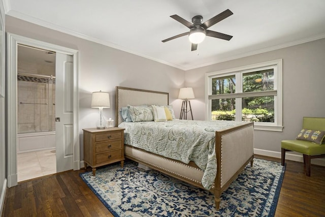 7265 Hunters Branch Dr, Sandy Springs, GA 30328 - bedroom featuring dark wood-type flooring, crown molding, baseboards, ensuite bathroom, and a ceiling fan