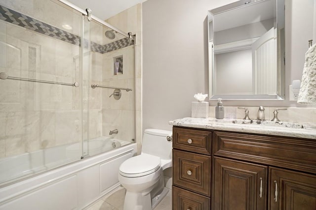 7265 Hunters Branch Dr, Sandy Springs, GA 30328 - bathroom with toilet, vanity, enclosed tub / shower combo, and tile patterned flooring