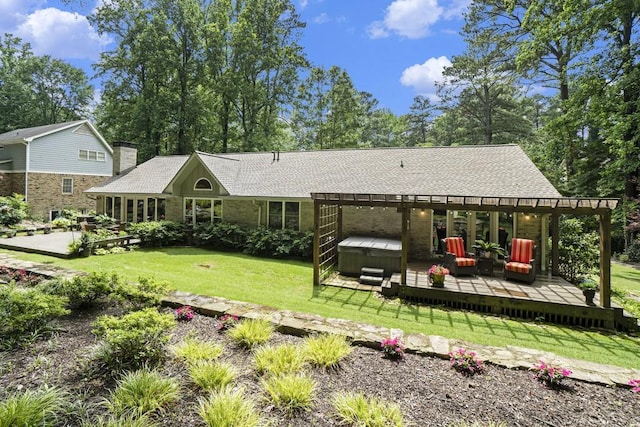 7265 Hunters Branch Dr, Sandy Springs, GA 30328 - back of property with a hot tub, a deck, a pergola, a lawn, and a shingled roof