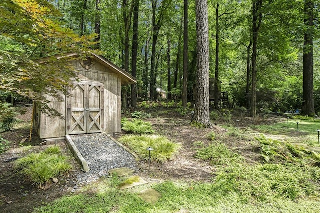 7265 Hunters Branch Dr, Sandy Springs, GA 30328 - view of shed featuring a view of trees