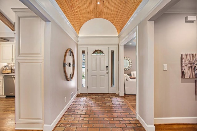 7265 Hunters Branch Dr, Sandy Springs, GA 30328 - entrance foyer with lofted ceiling, baseboards, wooden ceiling, brick flooring, and ornamental molding