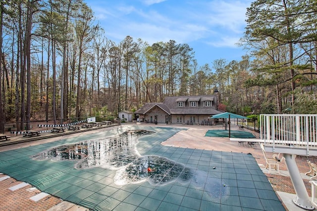 7265 Hunters Branch Dr, Sandy Springs, GA 30328 - community pool with a patio