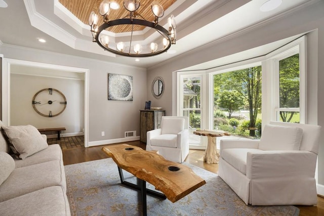 7265 Hunters Branch Dr, Sandy Springs, GA 30328 - living area featuring a raised ceiling, crown molding, a chandelier, baseboards, and recessed lighting