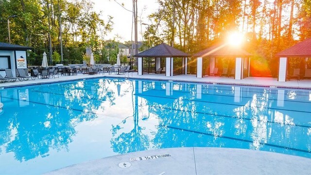 view of pool with a gazebo and a patio area