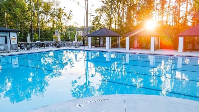 view of pool featuring a gazebo and a patio