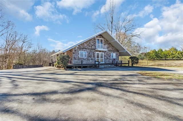 view of front of property featuring stone siding