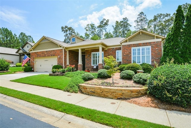 craftsman house featuring covered porch and a garage