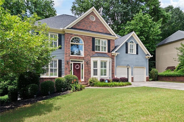 5418 Amity Dr, Powder Springs, GA 30127 - view of front of house featuring brick siding, concrete driveway, a front lawn, and a garage