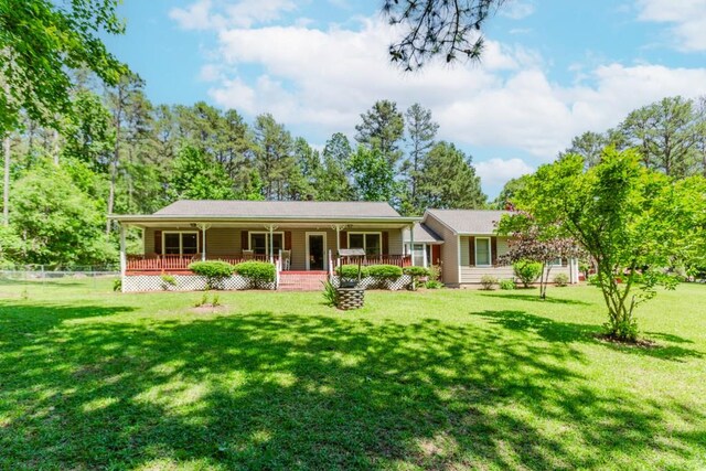 750 Jett Roberts Rd, Jefferson, GA 30549 - view of front of property featuring covered porch and a front lawn