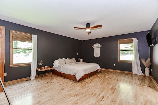750 Jett Roberts Rd, Jefferson, GA 30549 - bedroom featuring light wood-style floors, baseboards, and ceiling fan