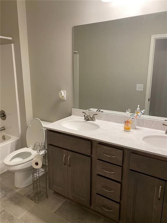 115 Harmony Farms Dr, Eatonton, GA 31024 - full bath featuring double vanity and tile patterned flooring