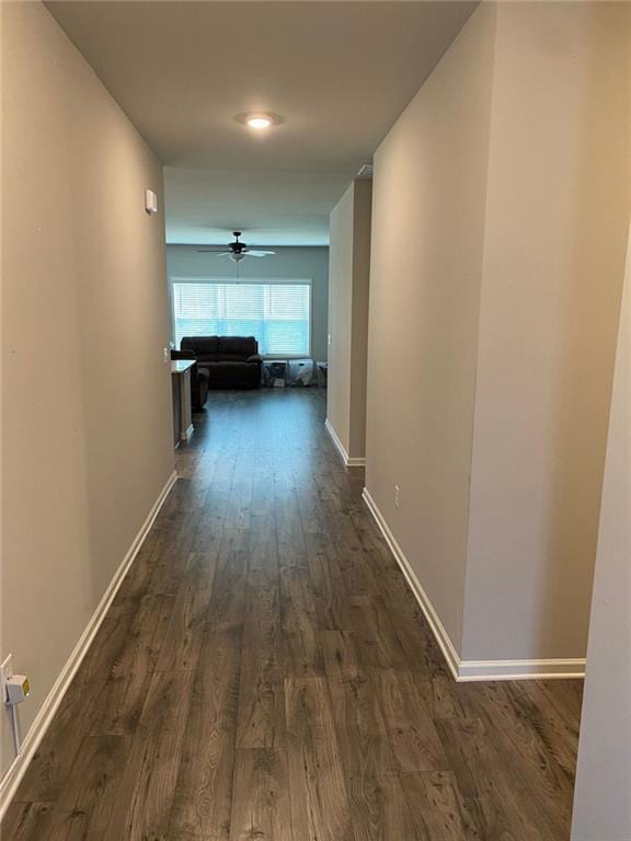115 Harmony Farms Dr, Eatonton, GA 31024 - hall featuring dark wood-style flooring and baseboards