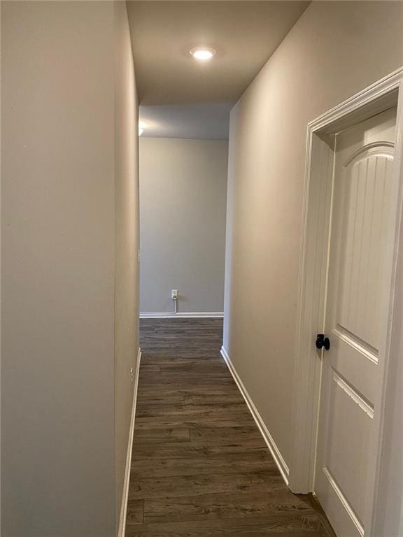 115 Harmony Farms Dr, Eatonton, GA 31024 - hallway with dark wood-type flooring and baseboards