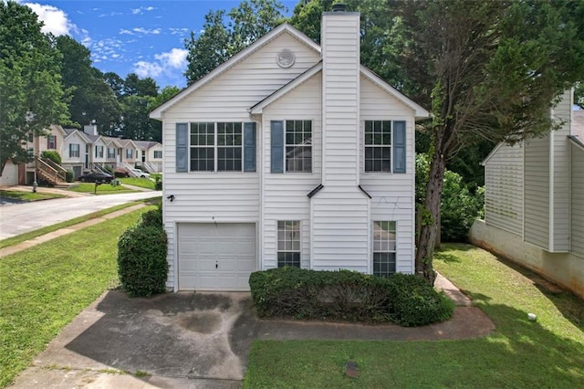800 Tradd Ct, Stone Mountain, GA 30087 - view of front of house featuring a garage, a chimney, concrete driveway, and a front lawn