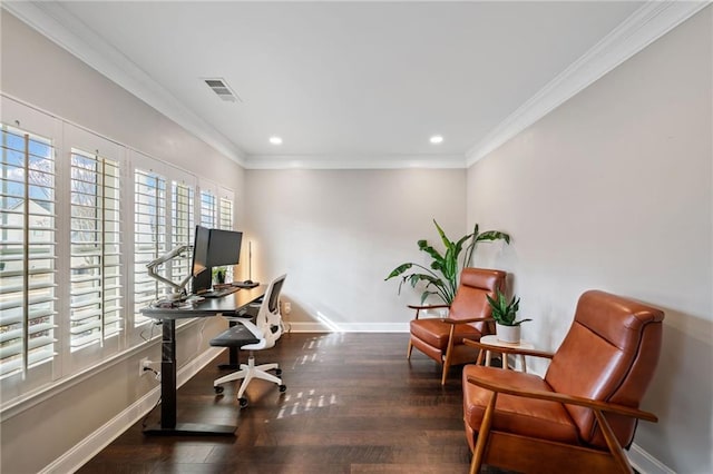 office with ornamental molding and dark hardwood / wood-style flooring