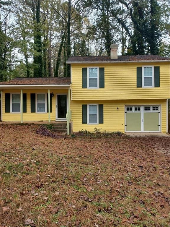 split level home featuring a garage