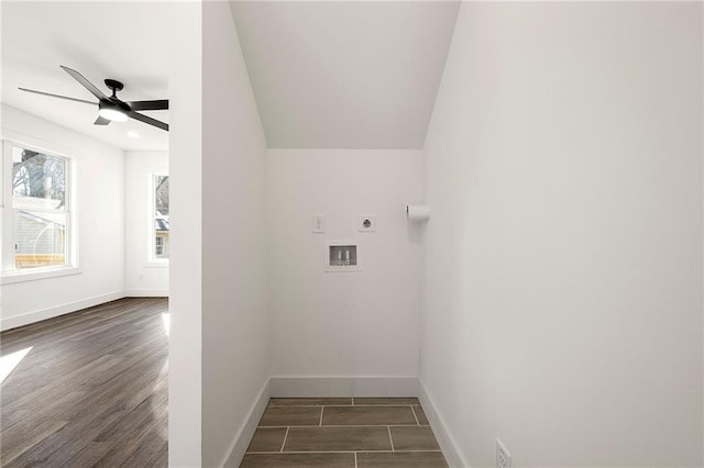 laundry room featuring a ceiling fan, baseboards, hookup for an electric dryer, laundry area, and dark wood-style flooring