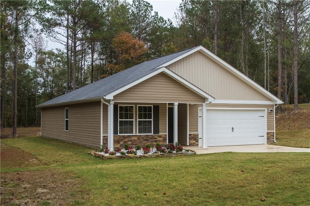 view of front facade featuring a porch, a garage, and a front lawn