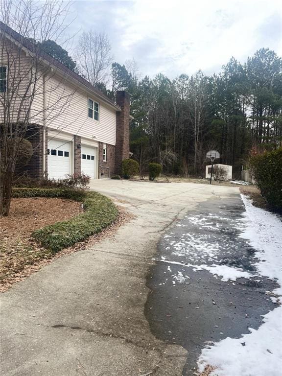 view of home's exterior with a garage