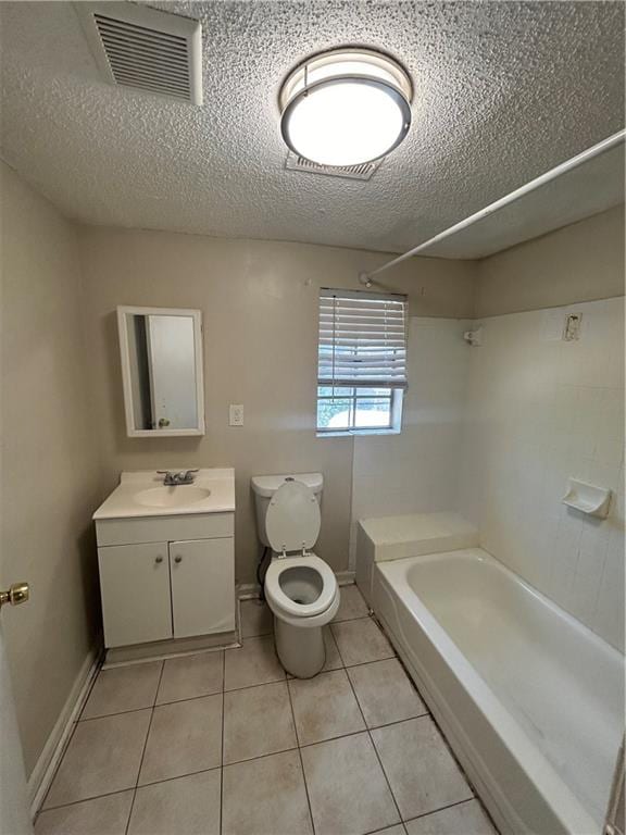 full bathroom with vanity, shower / washtub combination, toilet, and tile patterned floors