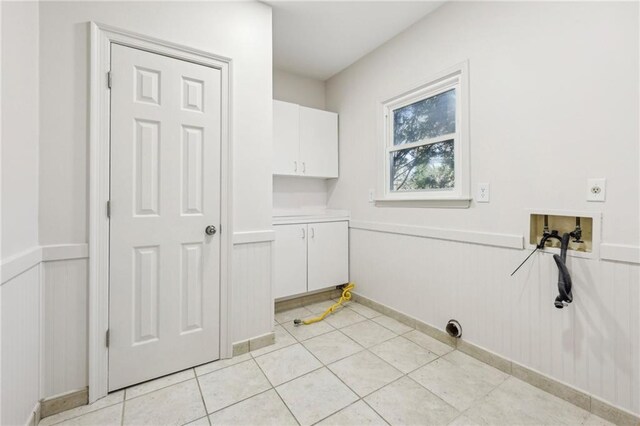 corridor featuring ornamental molding, light hardwood / wood-style flooring, and sink