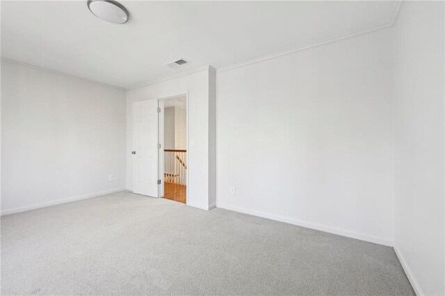 bathroom with crown molding, a wealth of natural light, vanity, and toilet