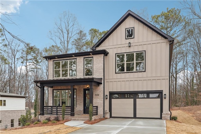 modern farmhouse style home with a garage and covered porch