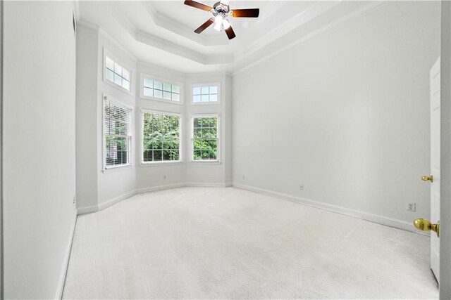 12554 Huntington Trce, Alpharetta, GA 30005 - carpeted spare room with ceiling fan, crown molding, baseboards, a tray ceiling, and a high ceiling