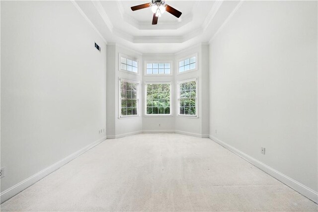 12554 Huntington Trce, Alpharetta, GA 30005 - carpeted empty room featuring a tray ceiling, crown molding, ceiling fan, and baseboards
