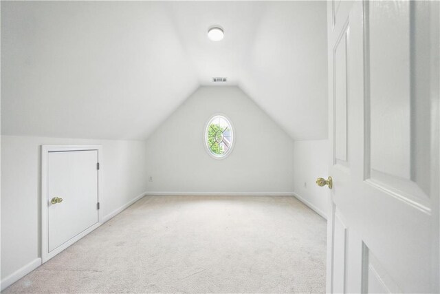 12554 Huntington Trce, Alpharetta, GA 30005 - bonus room featuring light carpet, lofted ceiling, and baseboards