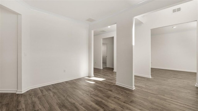 1149 Blue Juniper Cir, Loganville, GA 30052 - unfurnished bedroom featuring wood finished floors, baseboards, and crown molding