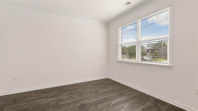 1149 Blue Juniper Cir, Loganville, GA 30052 - unfurnished room with ornamental molding, dark wood finished floors, and baseboards