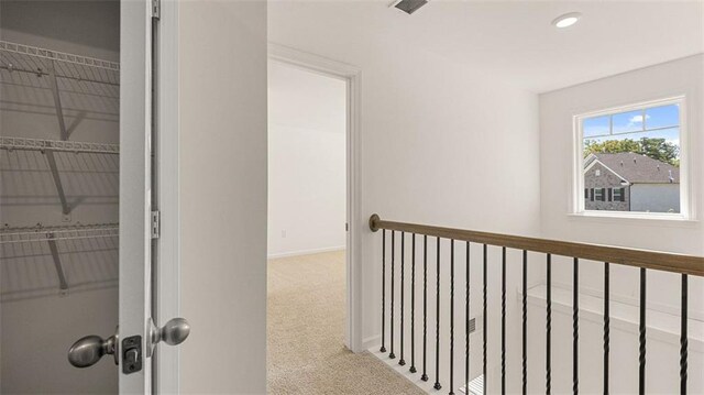 1149 Blue Juniper Cir, Loganville, GA 30052 - hall featuring carpet, baseboards, and recessed lighting