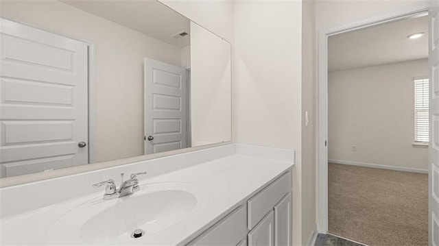1149 Blue Juniper Cir, Loganville, GA 30052 - bathroom featuring vanity and baseboards